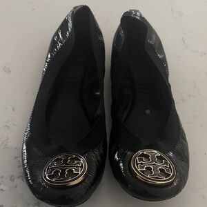 Tory Burch Shiny Black Flats with Gold Logo